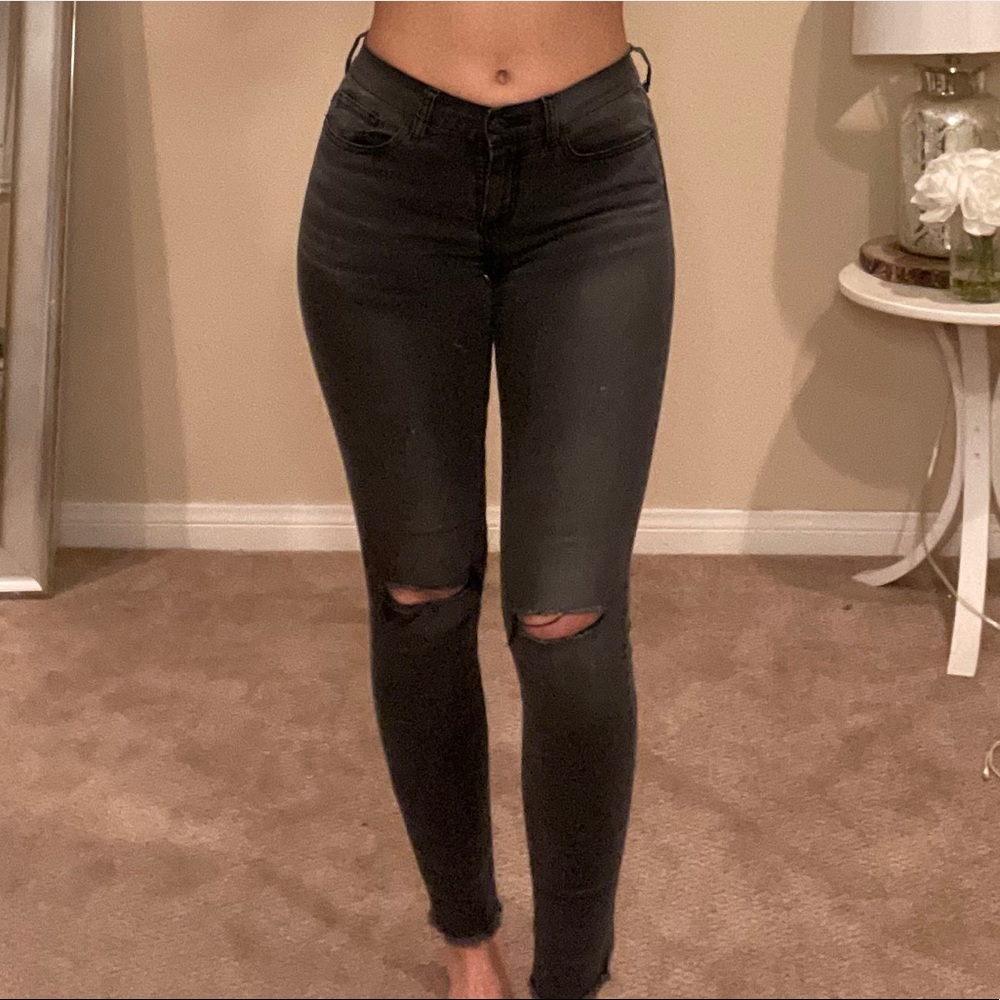 Dark grey distressed skinny jeans